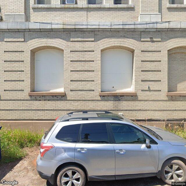 902 E 1ST ST, Dulu